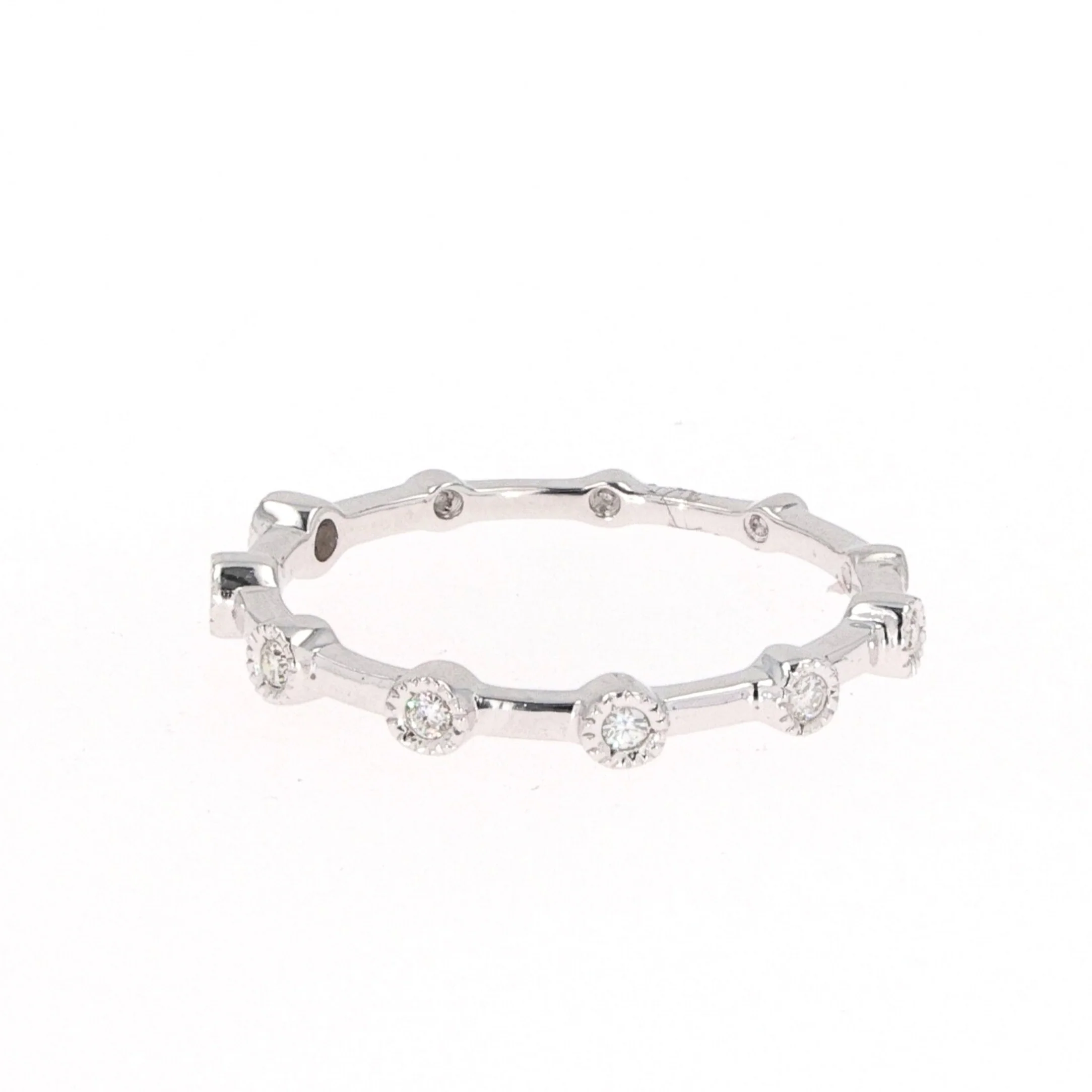 0.09 CTW DEW Round Moissanite Bezel Stackable Band in Sterling Silver - Image 2